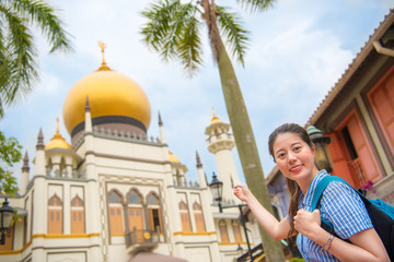 Fototapeta premium Happy Asia woman Travel in Singapore, Masjid Sultan