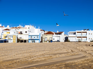 Wohnhäuser am Strand von Alporchinhos