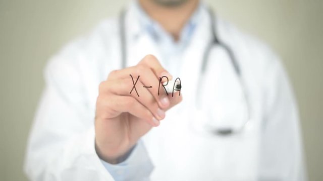 X-Ray, Doctor writing on transparent screen