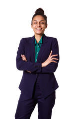 Successful young businesswoman standing with her arms crossed