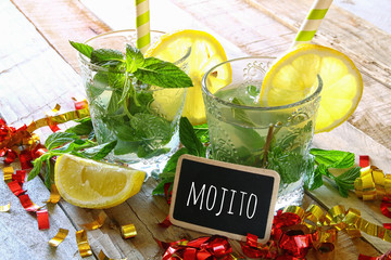 fresh mojito blackboard and sliced lemons