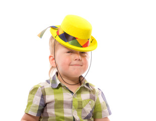 Little Funny boy in shirt and funny hat.