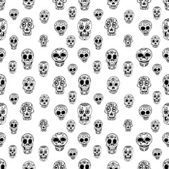 Seamless pattern with sugar skulls. Design element in vector.