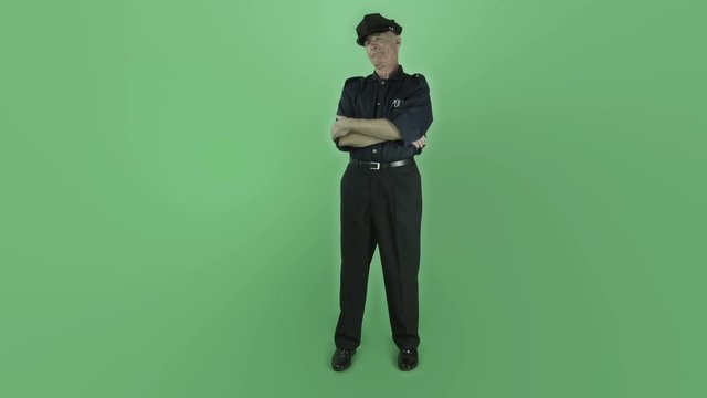 Senior caucasian vintage policeman isolated on chroma green screen confident