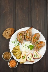 Baked roll with minced meat, cheese rolls and mayonnaise. Homework refreshments at the party.
