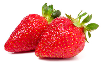 Two strawberries isolated on white background close-up macro