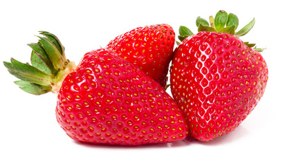 three strawberries isolated on white background close-up macro