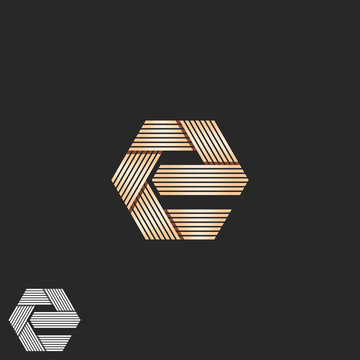 Luxury letter E orange monogram, overlapping parallel line geometric shape mockup t-shirt print, intersection stripe
