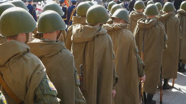 Formation of soldiers in dress parade uniform. National holiday –Victory day. Military parade.
