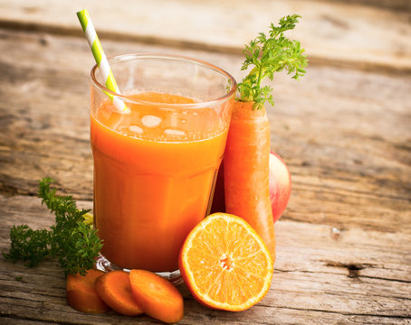 Carrot juice in the glass closeup