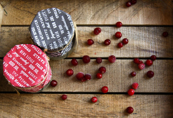Candles in gift wrap looking like jam-pots top view