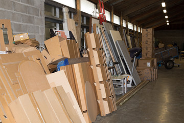 Cardboard boxes in a very big warehouse