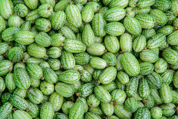 Fresh cucamelon (Melothria scabra) background texture