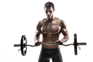 Fototapeta na wymiar Young handsome man with naked torso and barbell