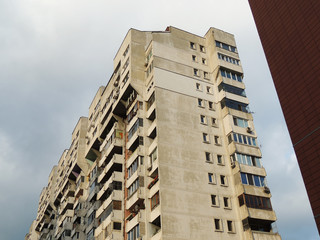 Old blocks of flats left from the socialist years right next to one of the biggest malls in the capital city of Sofia, Bulgaria