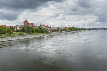 Obraz premium Torun in Poland, Old Town skyline, fortified medieval city, river view.