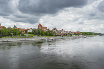 Fototapeta premium Torun in Poland, Old Town skyline, fortified medieval city, river view.