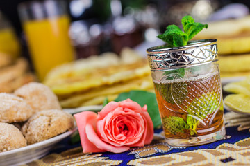 Moroccan tea glasses and biscuit