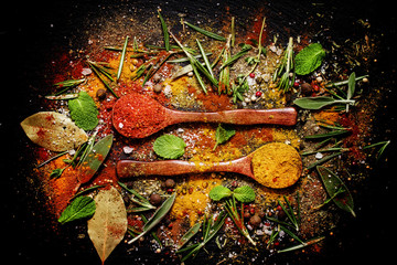 Food background, spices, peppers, salt, herbs, mint leaves, top