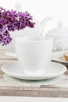 Composition of white porcelain cup