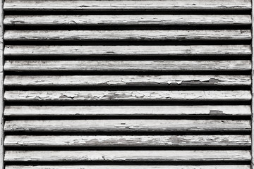 wooden shutters, covering a window or door