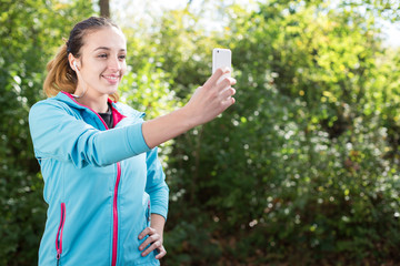 Running woman. Female runner relaxing after jogging outdoor work