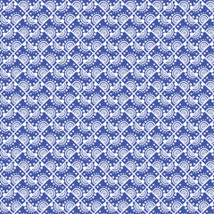 Seamless vector pattern. Symmetrical geometric background with blue rhombus. Decorative repeating ornament.