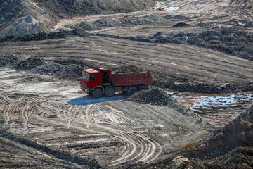 Excavation site with construction machine