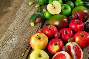 Fototapeta na wymiar Fruits on wooden background