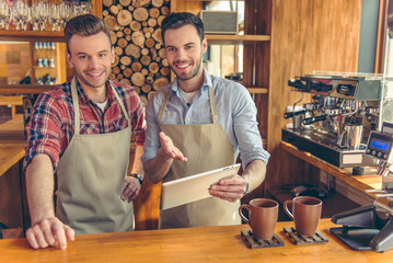 Handsome workers at cafe