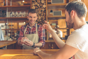 Handsome men at cafe