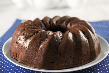 Chocolate cake on blue polka dot napkin