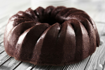 Chocolate cake on wooden background