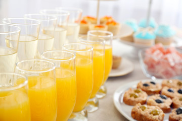 Set of cold snacks, canape, beverages and dessert, closeup