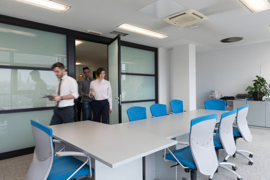 Business People Group Entering Meeting Room, Motion Blur