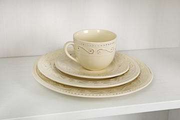 Dishes in cupboard in the kitchen