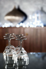 Upturned wine glasses on the table