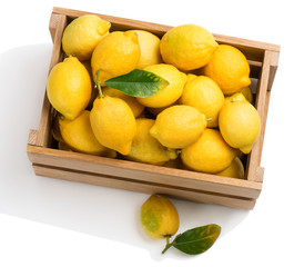Lemons in a crate, above view.