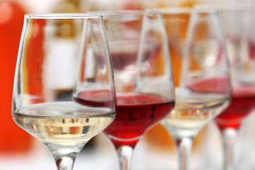 Wine glasses with red and white wine, closeup