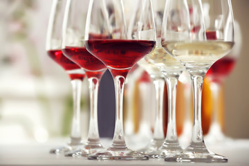 Wine glasses with red and white wine, closeup