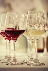 Wine glasses with red and white wine, closeup