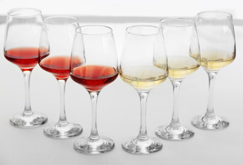 Wine glasses with red and white wine, closeup