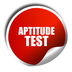 aptitude test, 3D rendering, red sticker with white text