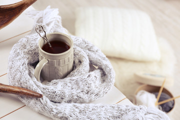 Cup of hot drink in living room. Comfortable winter weekend or holidays at home
