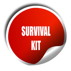 Survival kit sign, 3D rendering, red sticker with white text