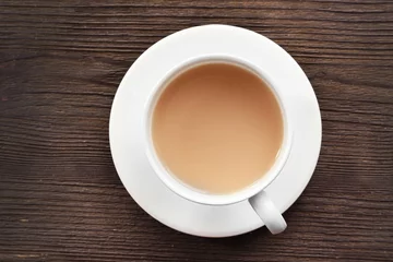 Crédence de cuisine en verre imprimé Theé Milk tea on wooden background.