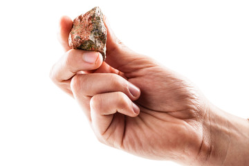 Holding a unakite piece