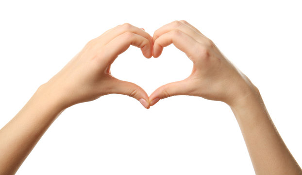 Female hands in heart shape on white background