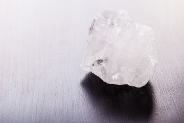 rock crystal on wood