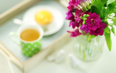Flowers in vase on table, closeup